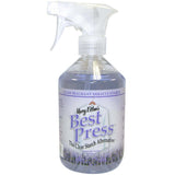A clear spray bottle with white trigger containing purple-tinted liquid, featuring a lavender field design on the white label.