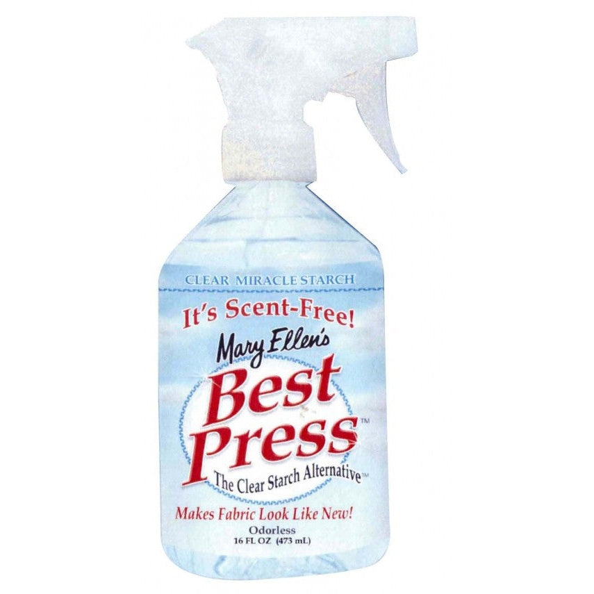 Clear spray bottle with blue and white labeling containing Mary Ellen's Best Press scent-free fabric starch alternative, 16 fl oz size with white trigger sprayer.