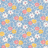 Scattered flowers in blue, white, pink and yellow. Take a step ba