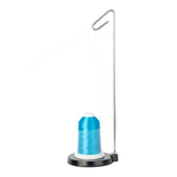Metal thread stand with a blue cone of Elite polyester thread on a white background