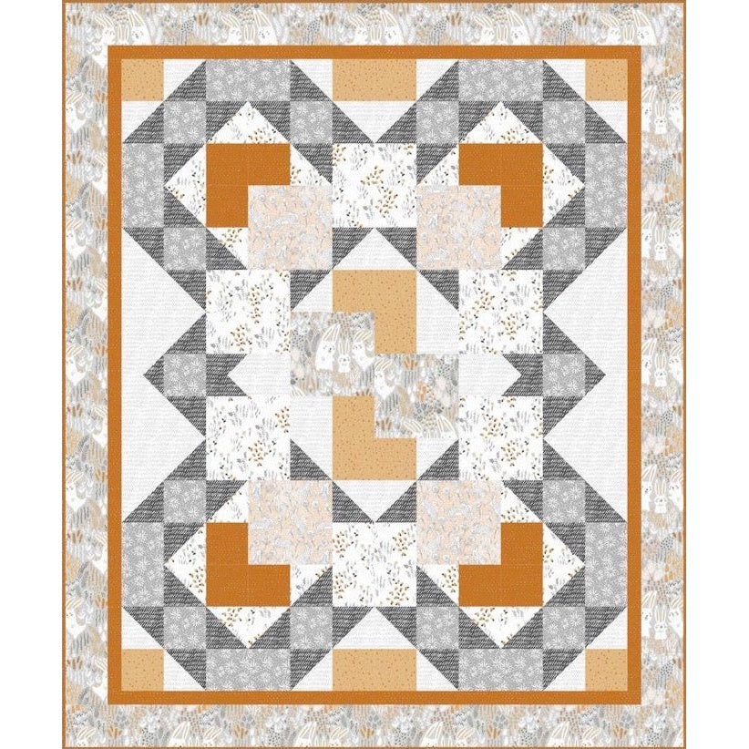 A geometric quilt pattern featuring orange, gray, and white fabric pieces arranged in repeating star-like blocks with decorative borders.