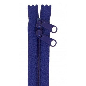A 30-inch cobalt blue zipper with two pull tabs, displayed vertically against a white background.