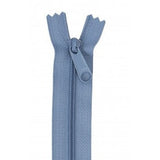 Blue 24-inch zipper with matching pull tab, shown partially open against white background.