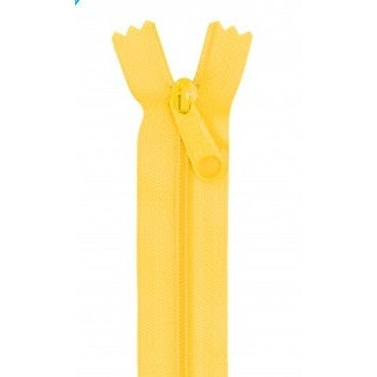 Yellow 24-inch zipper with matching pull tab and tape in bright dandelion color.