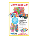 Colorful zippered bags in three sizes featuring bright floral and geometric patterns with contrasting handles and trim.