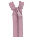 Dusty rose pink zipper with matching pull tab, displayed open against white background.