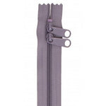 Gray 30-inch zipper with two matching gunmetal pull tabs and decorative scalloped tape ends.