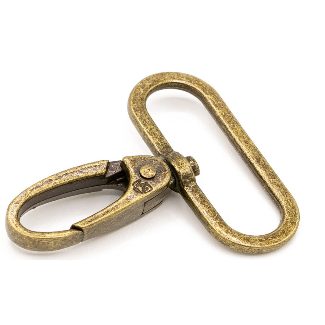 Two antique brass swivel hooks with weathered golden finish, featuring oval-shaped rings and spring-loaded clasps.