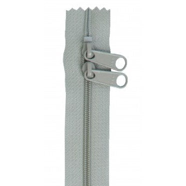 Gray 30-inch zipper with two matching pull tabs on light gray fabric tape.