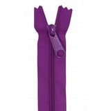 Purple 24-inch zipper with matching pull tab, shown partially open against white background.