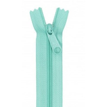 Turquoise zipper with matching pull tab in open position showing light blue-green color and standard teeth design.