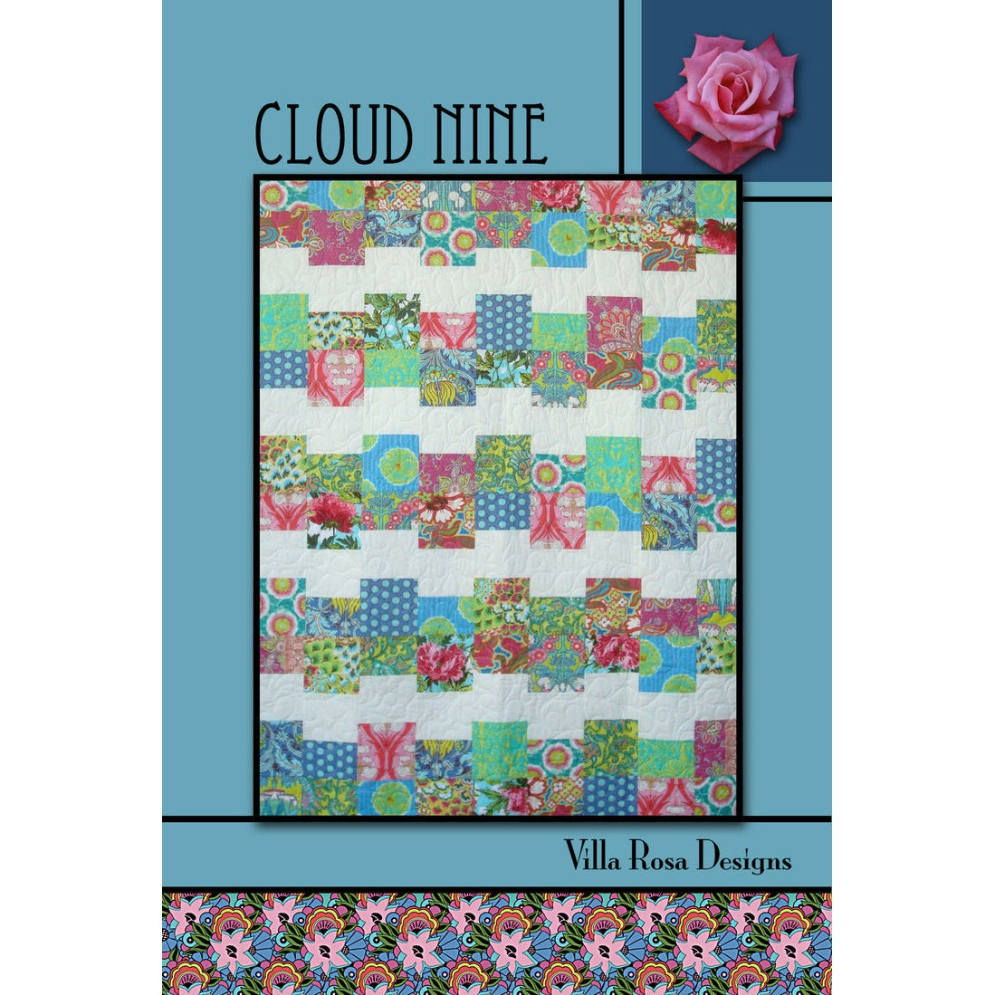 A colorful patchwork quilt pattern called "Cloud Nine" featuring vibrant floral and geometric fabric squares arranged in an offset brick layout on a blue background.