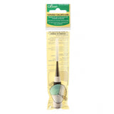 Clover brand tapered tailor's awl in white and green packaging, featuring a pointed metal tool with white handle for punching holes in leather and fabric.