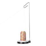 Thread stand with colorful thread spool on a white background
