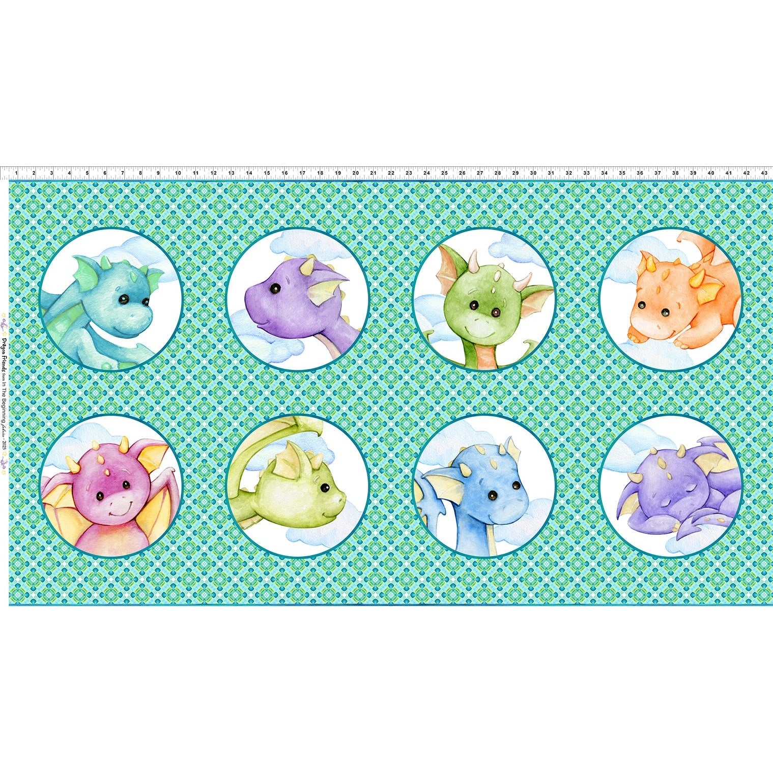 Colorful fabric panel featuring eight cute cartoon dragon faces in circles on a green geometric background with measurement ruler along the top.