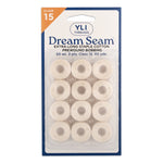 Package of 12 cream colored Dream Seam cotton thread bobbins in clear plastic blister pack