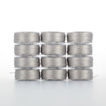 Twelve gray thread spools arranged in four rows of three, showing silver-gray thread wound on clear plastic bobbins