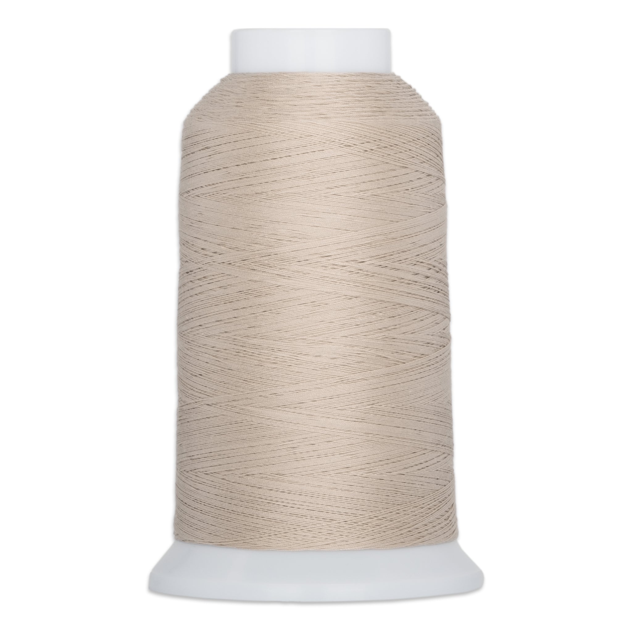 Beige thread wound on white plastic cone with tapered shape and wide base