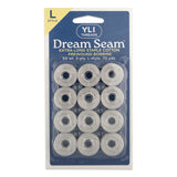 Package of 12 clear plastic bobbins with white thread, YLI Dream Seam cotton prewound bobbins in blue retail packaging
