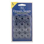 Clear prewound bobbins of Dream Seam cotton thread in L-style plastic cases, packaged in blue and yellow retail blister pack