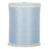 Light blue Dream Seam thread wound on white plastic spool with clear plastic ends