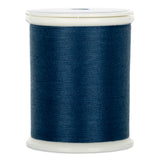 Dark blue thread on white plastic spool with clear top, wound evenly around the core
