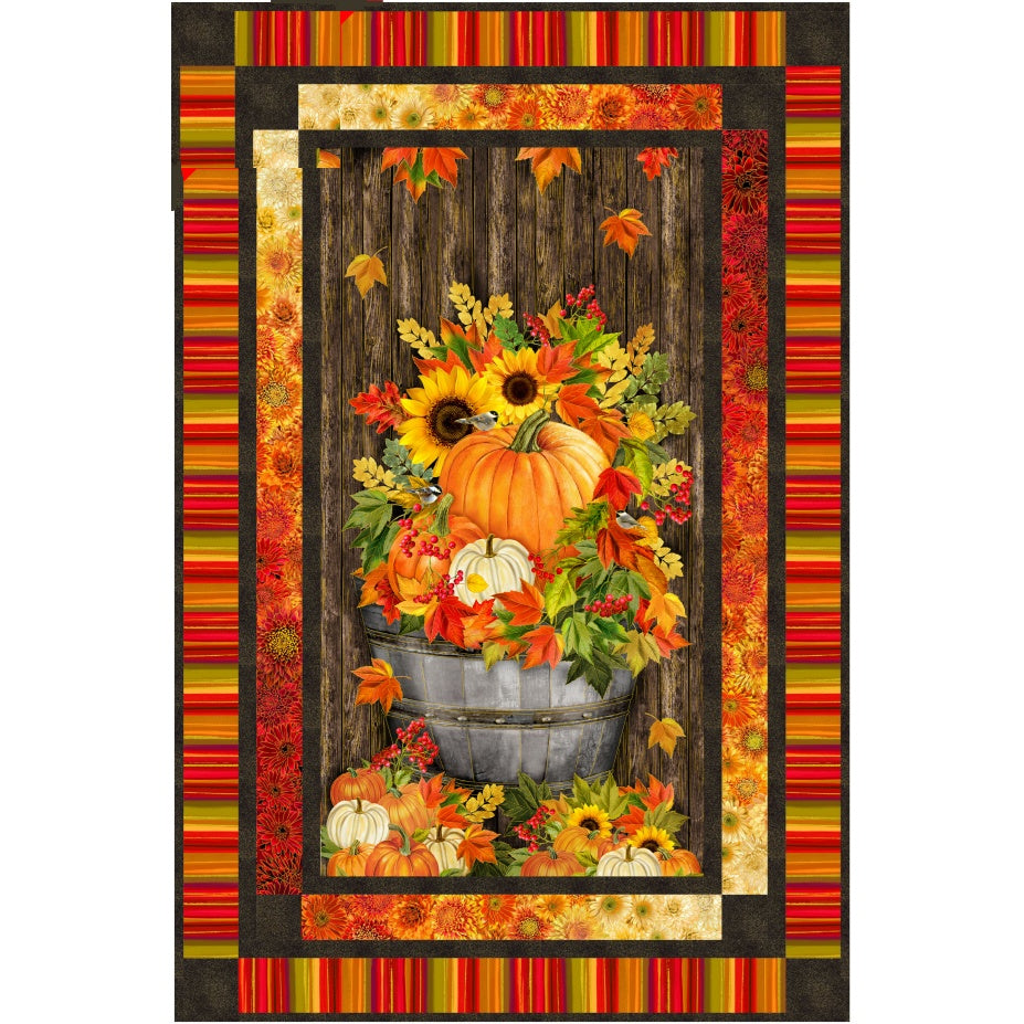 Autumn-themed quilt featuring a rustic wooden fence backdrop with pumpkins, sunflowers, and fall foliage in a galvanized bucket, surrounded by colorful striped and floral borders.