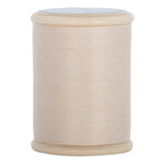 Ecru hand quilting thread wound on wooden spool with visible thread texture and smooth finish