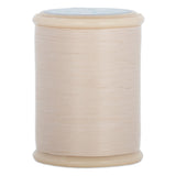 Ecru hand quilting thread wound on wooden spool with visible thread texture and smooth finish
