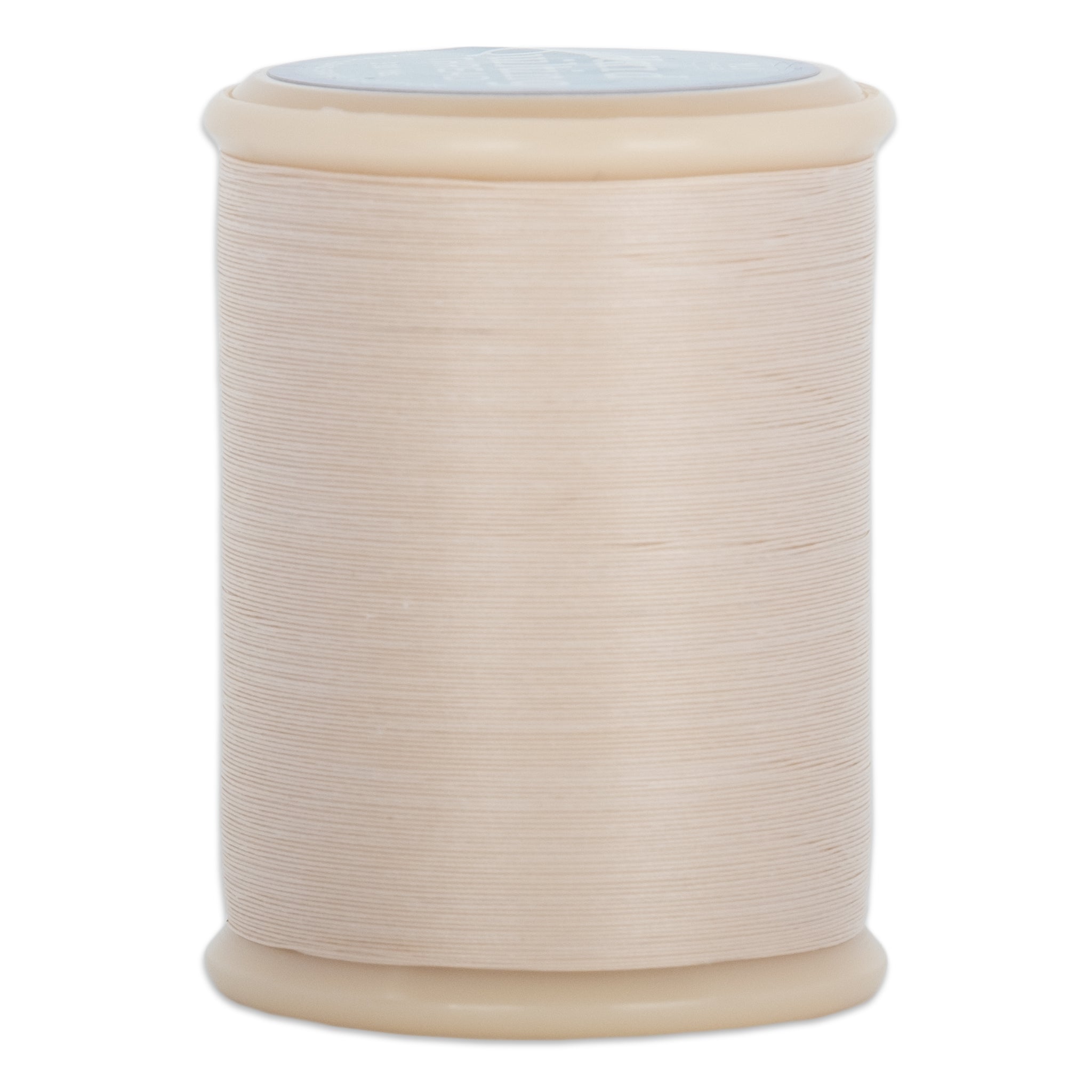 Ecru hand quilting thread wound on wooden spool with visible thread texture and smooth finish