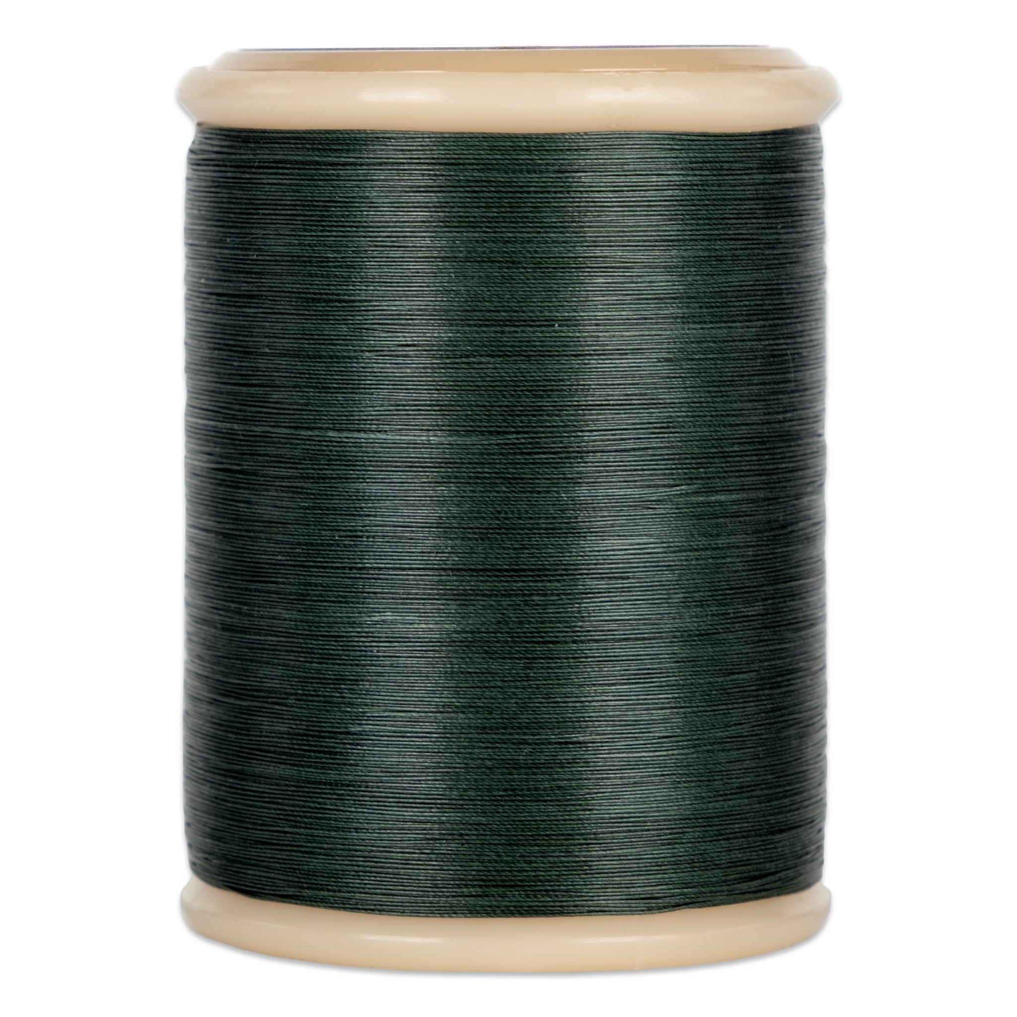 Green hand quilting thread wound on wooden spool with cream-colored ends