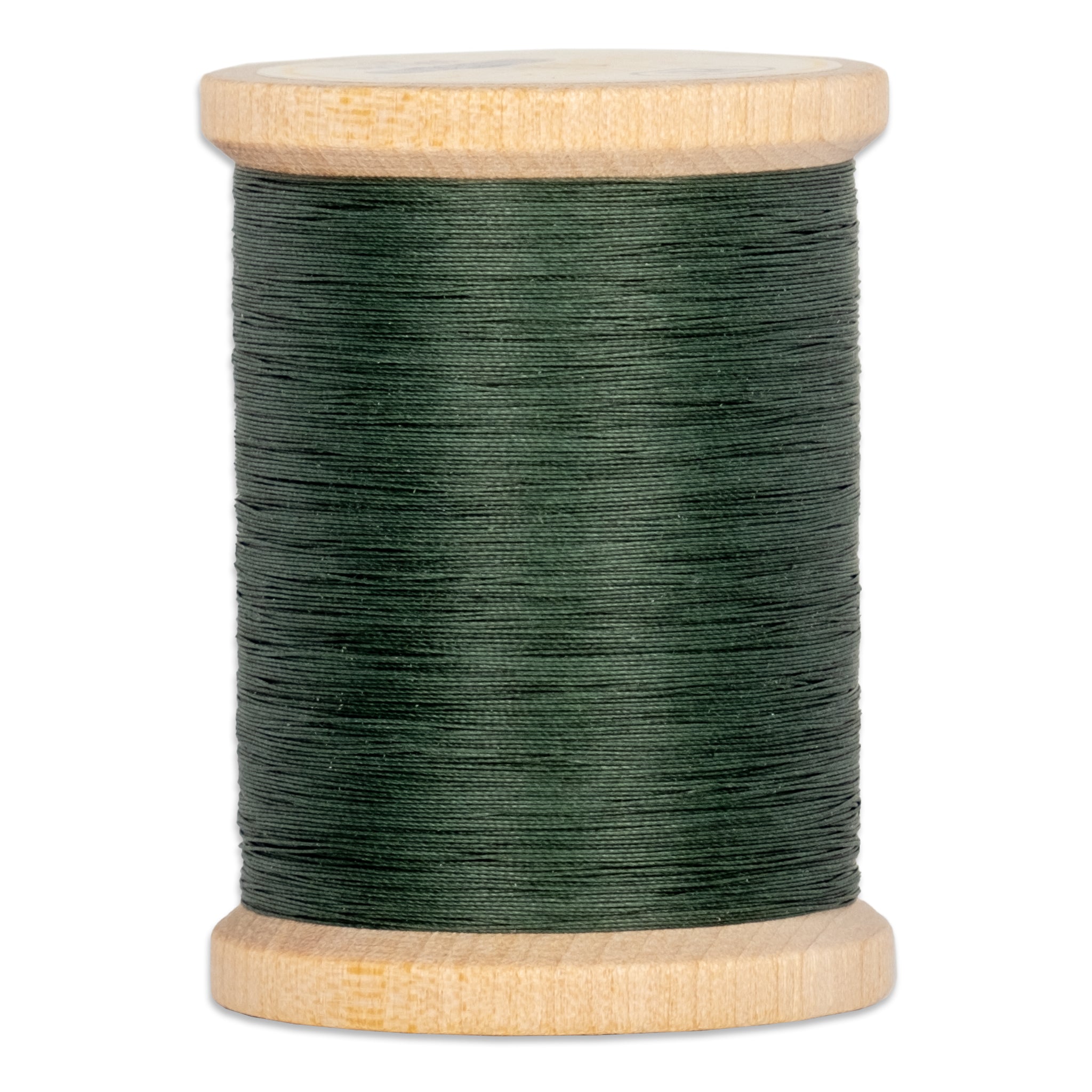 Green hand quilting thread wound on wooden spool with natural wood finish