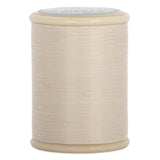 Natural 40 wt hand quilting thread wound on cream plastic spool with clear protective top