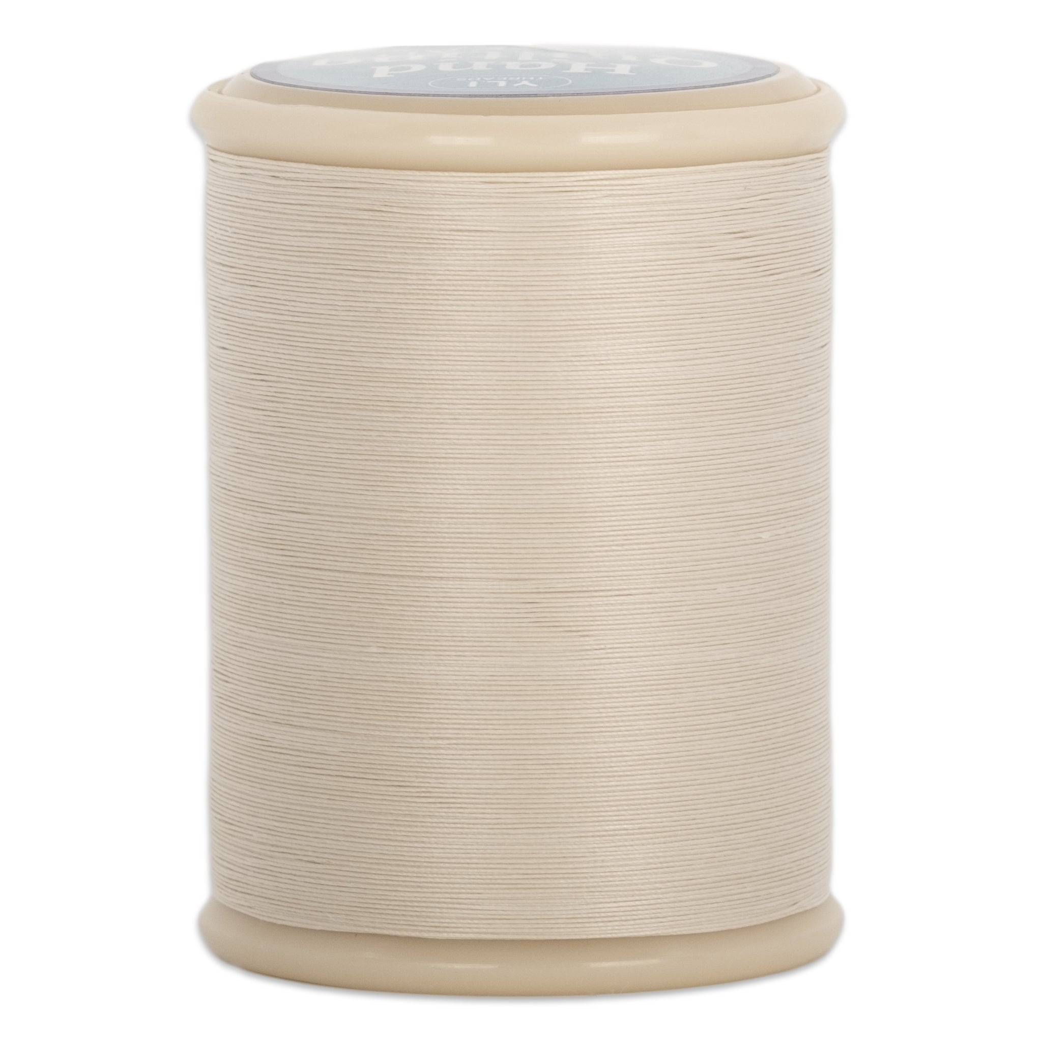 Natural 40 wt hand quilting thread wound on cream plastic spool with clear protective top
