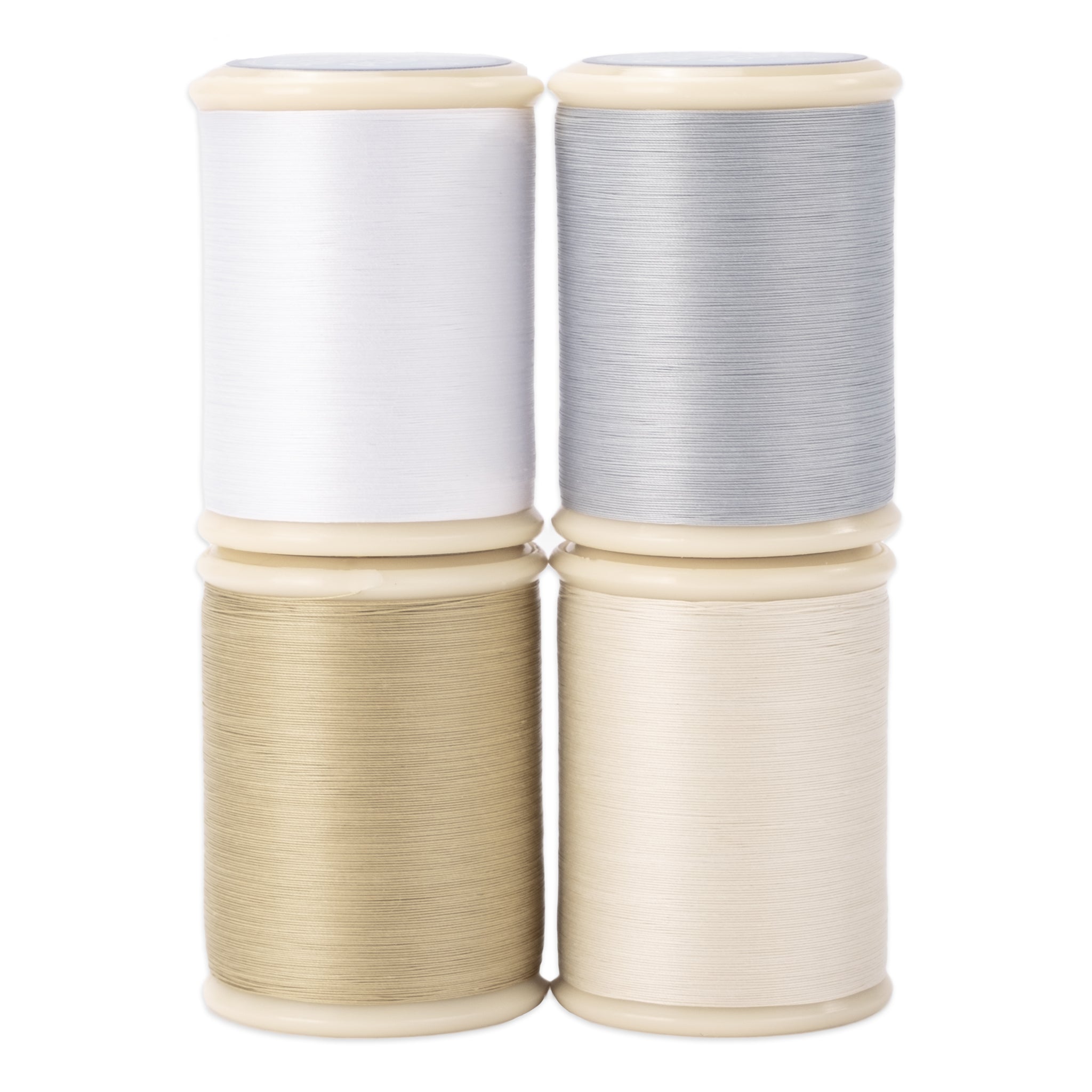 four spools of cotton hand quilting thread in the light neutrals set