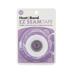 White roll of fusible seam tape in clear plastic packaging with purple and white branding for Heat n Bond EZ-Steam product.