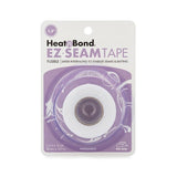 White roll of fusible seam tape in clear plastic packaging with purple and white branding for Heat n Bond EZ-Steam product.