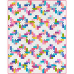 Colorful quilt kit featuring a modern star pattern with bright multicolored fabric pieces arranged in a geometric design on white background.