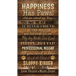Brown wood-grain fabric panel with cream text featuring dog-themed sayings like "Happiness Has Paws" and "You Had Me At Woof" with small paw print designs.