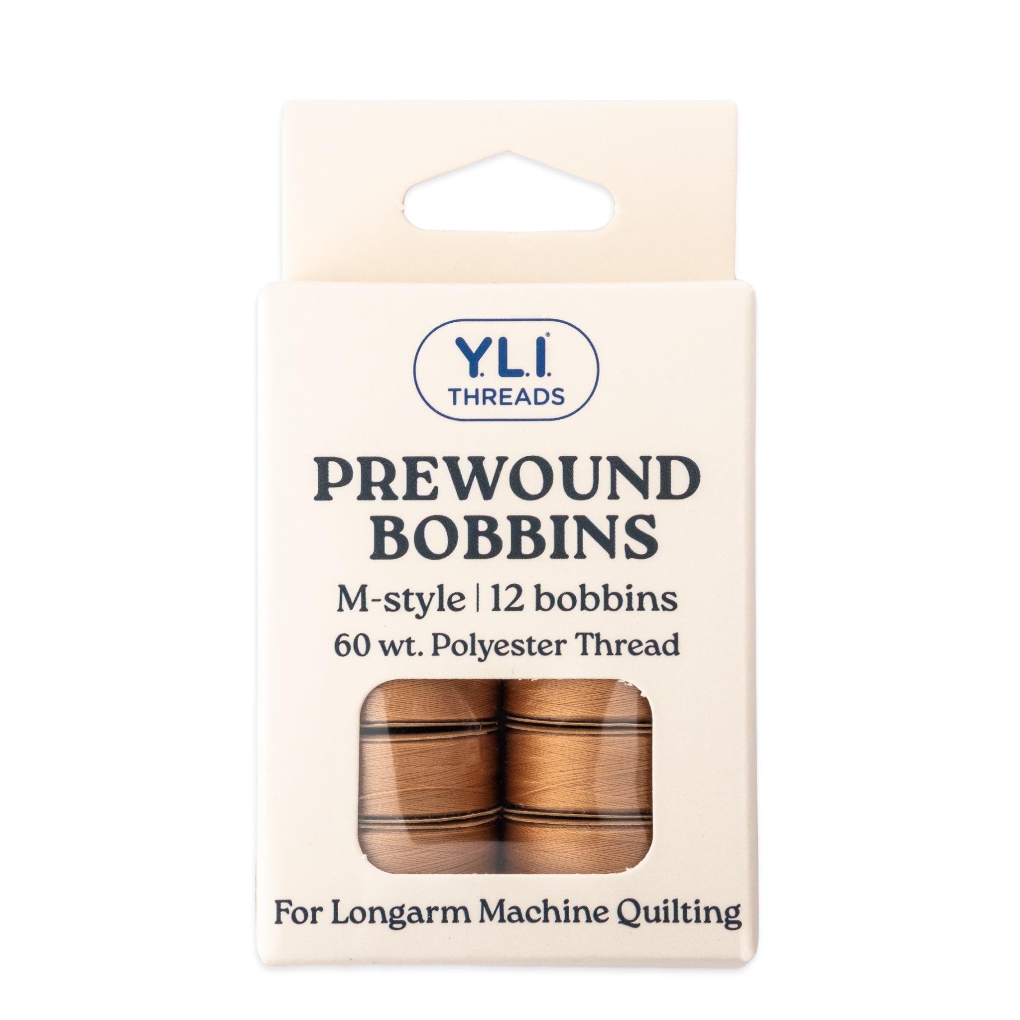Light brown M-style prewound bobbins for longarm quilting