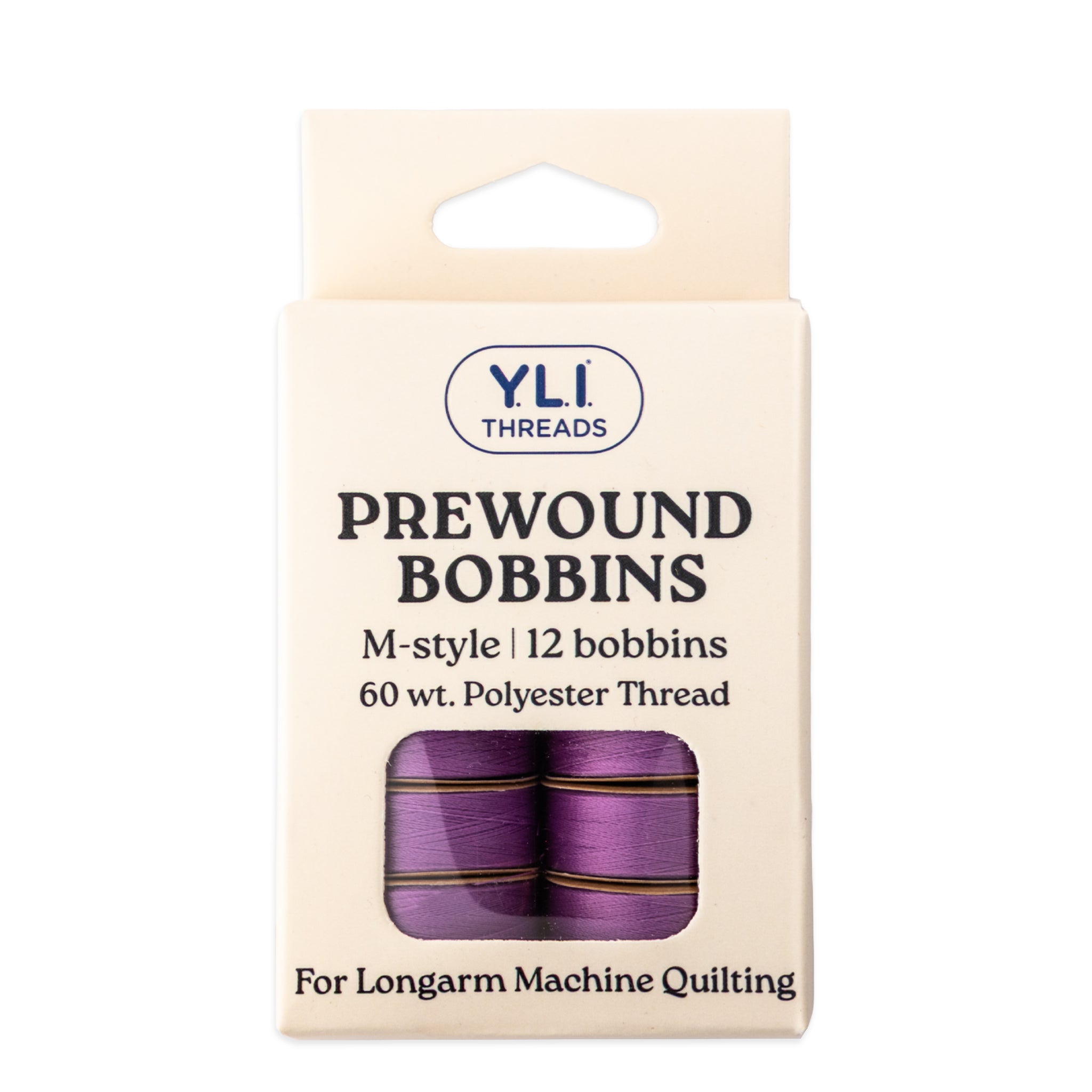 Light purple M-style prewound bobbins for longarm quilting