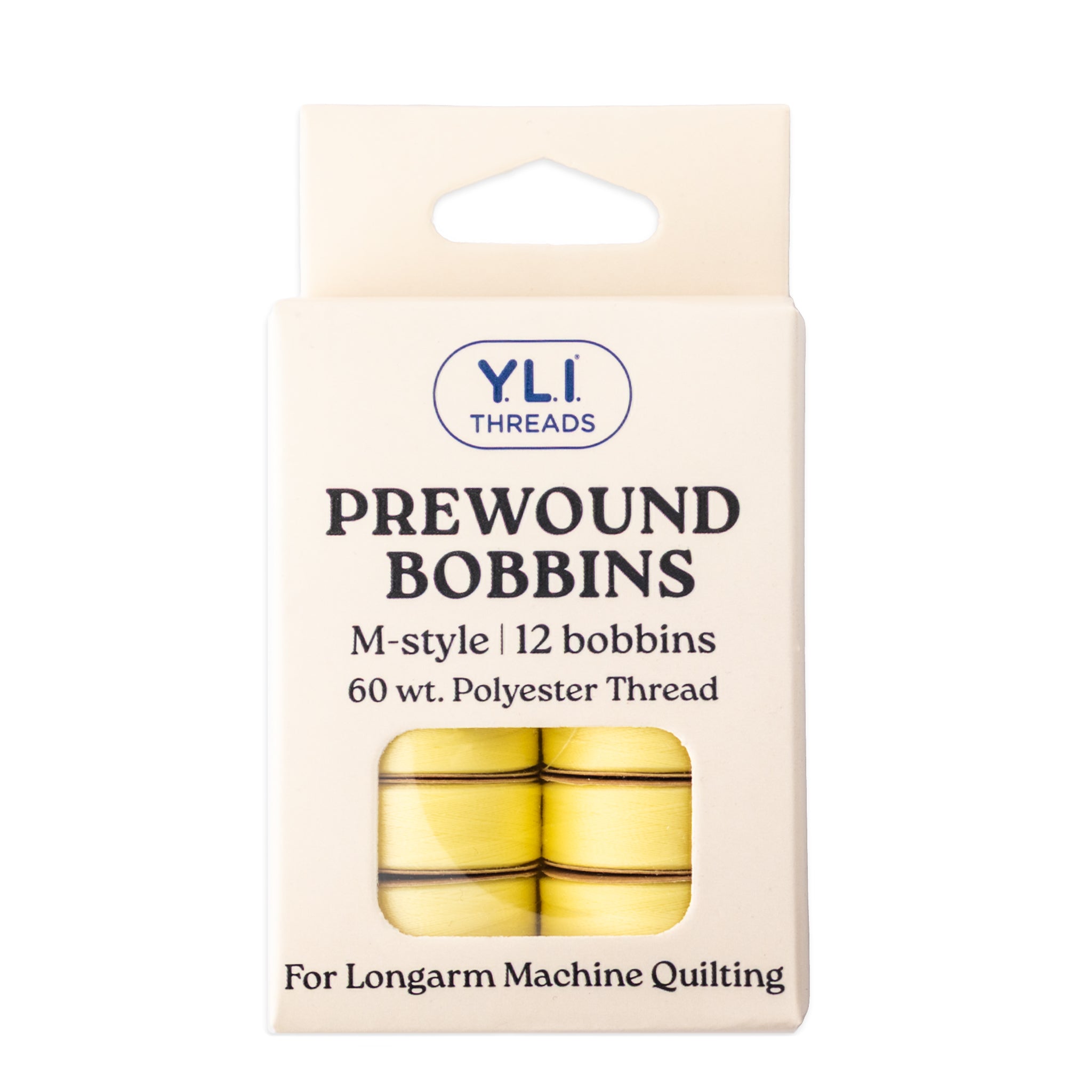 Light yellow M-style prewound bobbins for longarm quilting