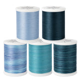 Blue spools of cotton Machine Quilting Thread by YLI Threads