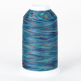 Multicolored variegated thread on white cone with blues, greens, and purples in striped pattern