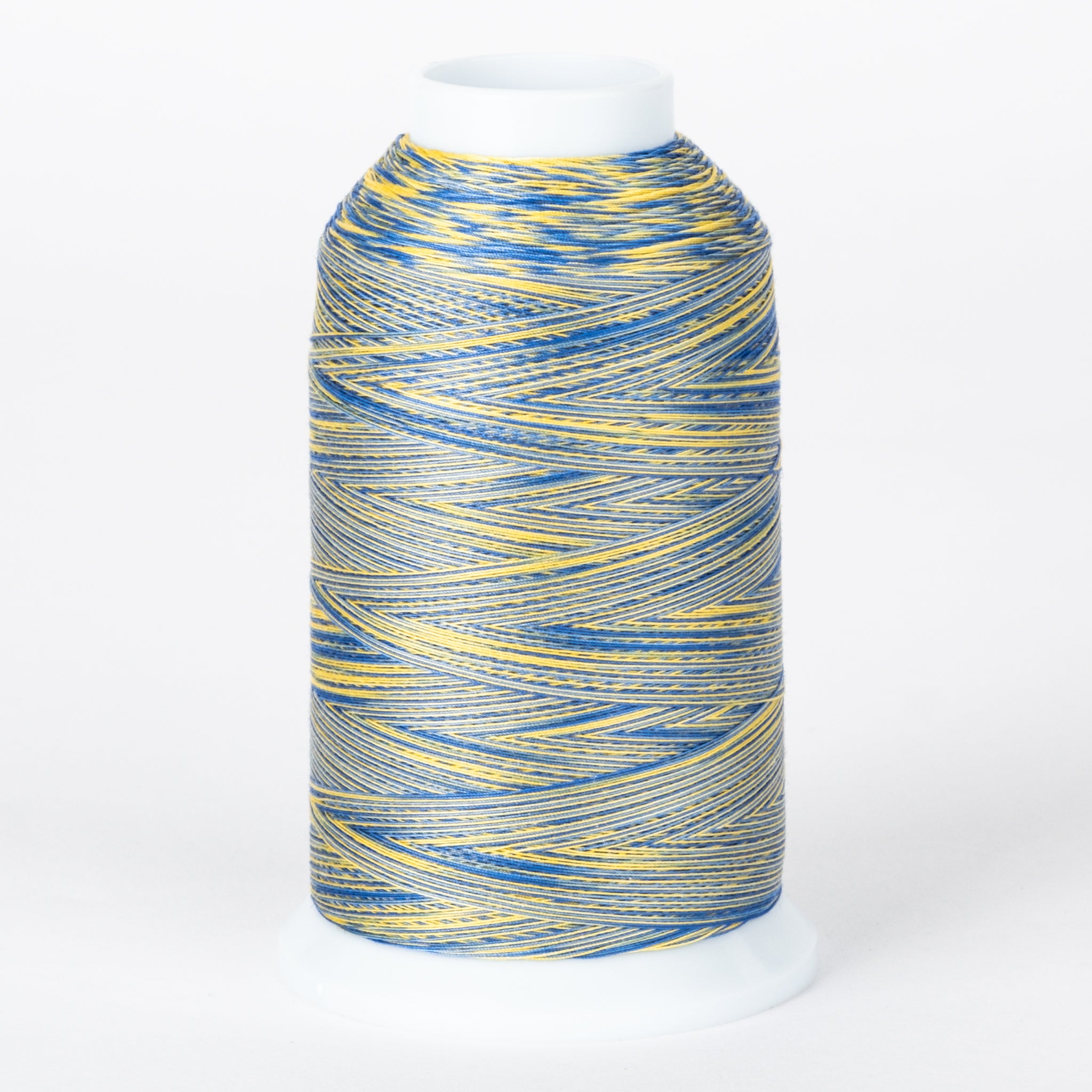 Blue and yellow variegated 40 wt thread on white cone with clear plastic top