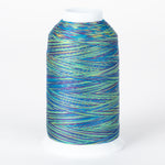 Multicolored variegated thread on white cone featuring blue, green, yellow, and purple strands wound together