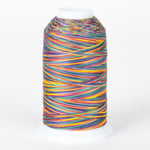 Multicolored variegated thread on white cone with rainbow stripes in yellow, red, blue, green, and purple