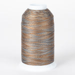 Cobblestone variegated thread cone with brown, gray, and tan colors wound on white plastic spool
