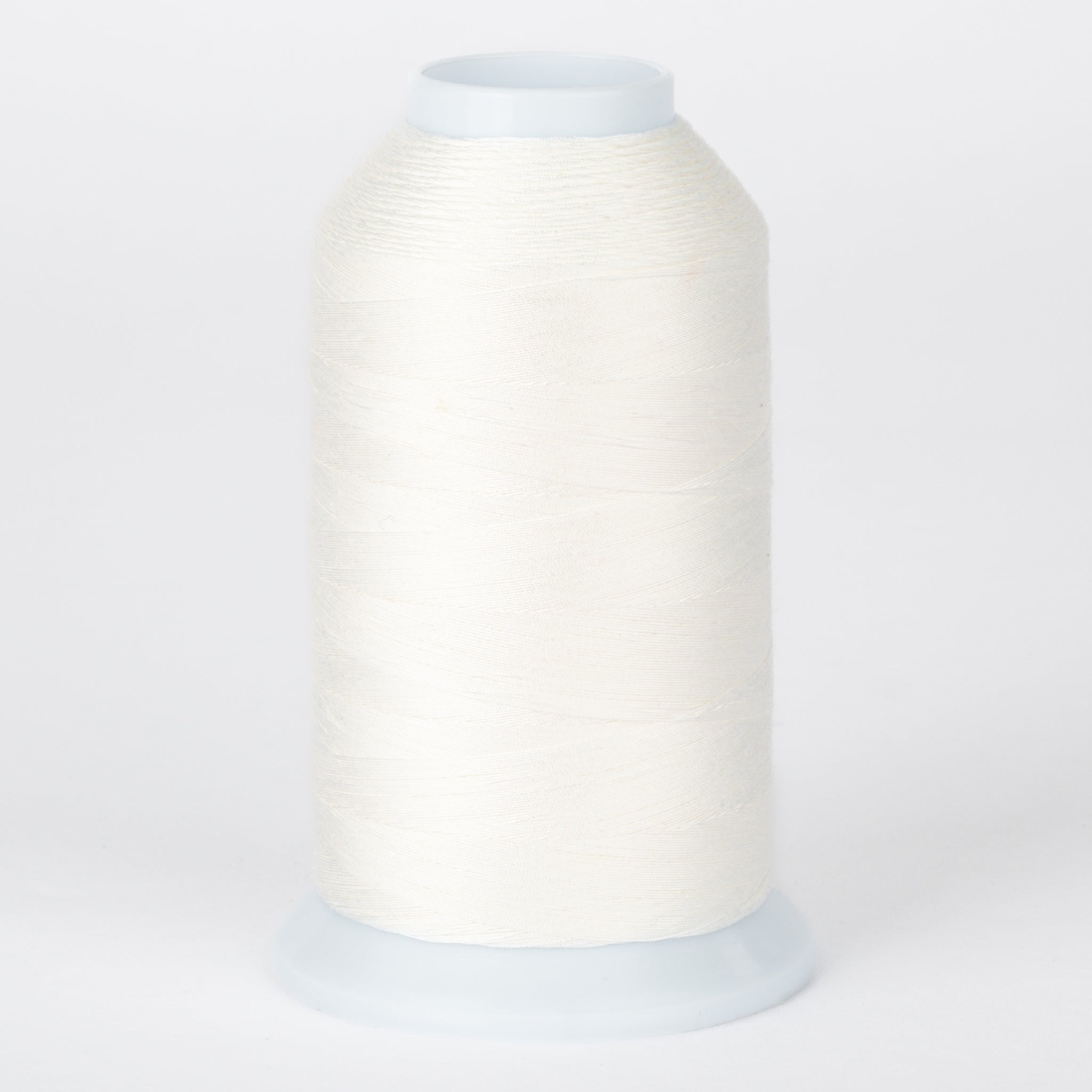 White embroidery thread on large cone spool with pale blue plastic top and bottom caps