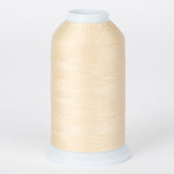 Antique cream thread wound on white plastic cone with clear cap